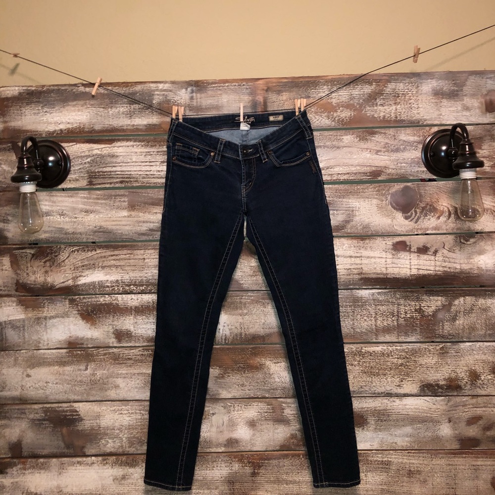 Silver dark wash skinny jeans
